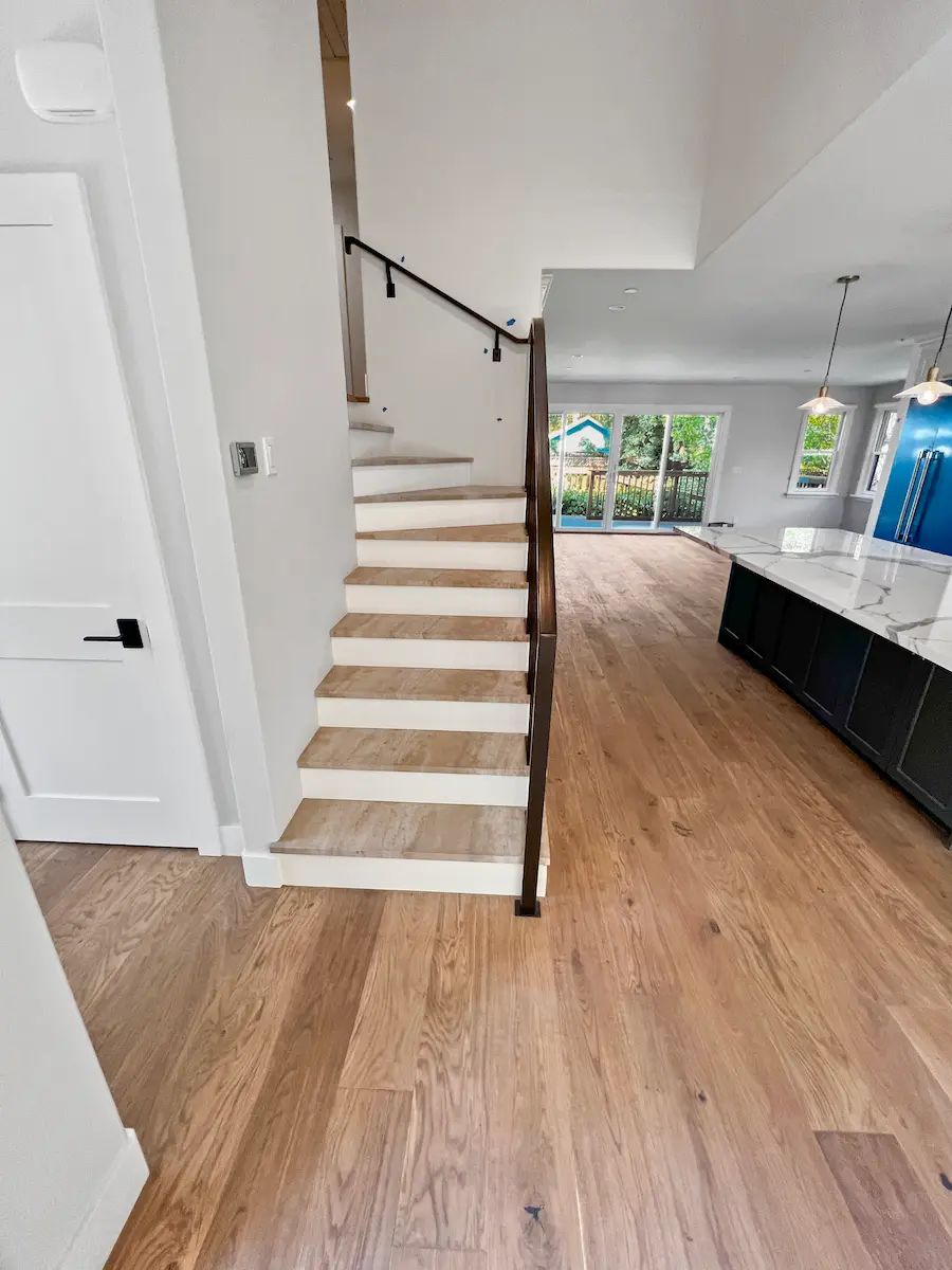 Open-layout kitchen remodeled by Alpine Haus Construction in the South Bay area